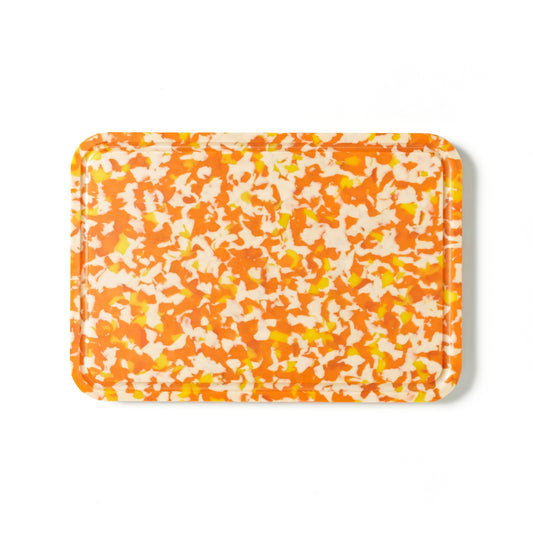 Orange, yellow and white rectangular Pinchy serving tray – terrazzo-style kitchenware photographed on white background