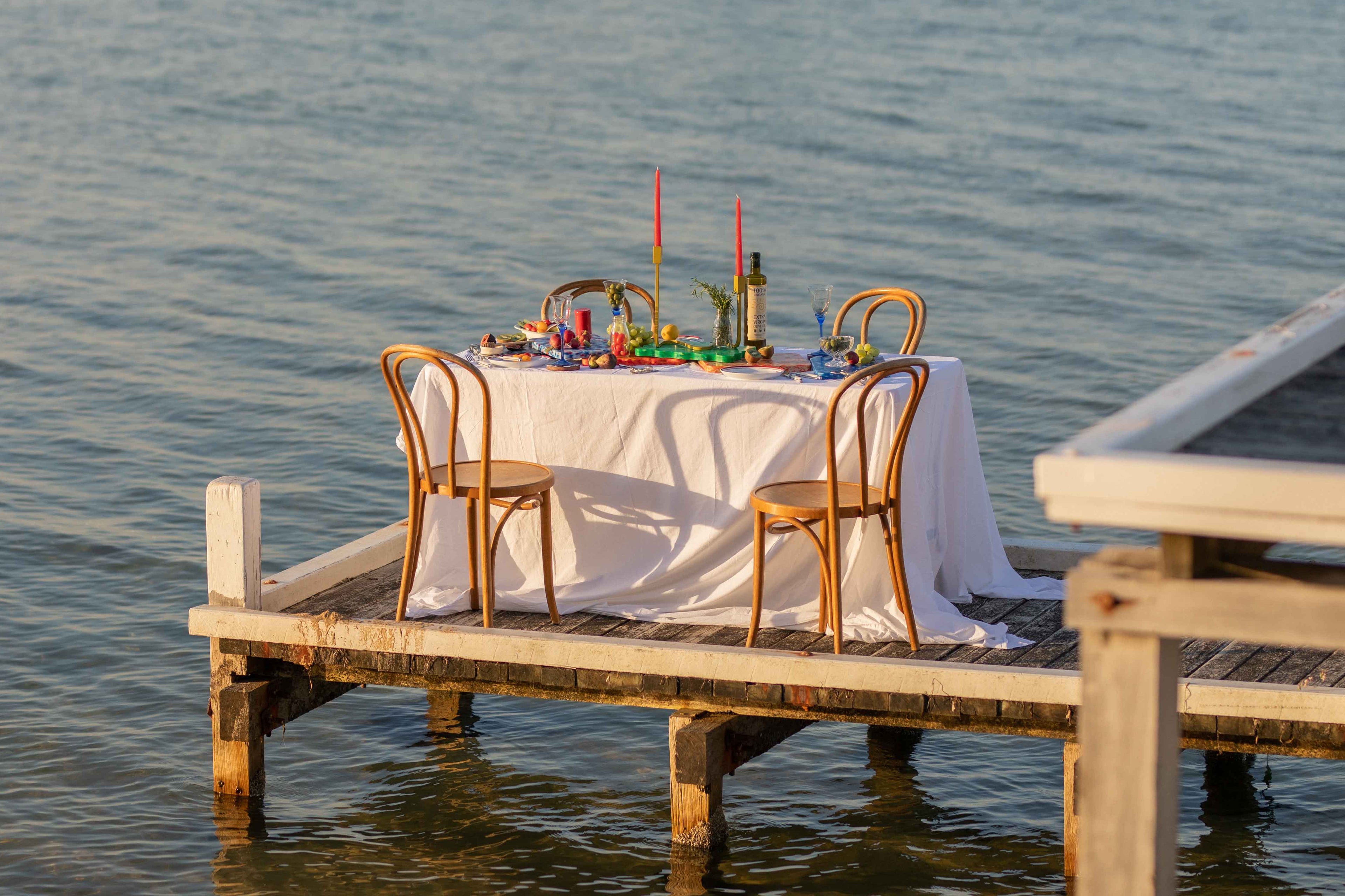 Dining setting on the water with pinchy chopping boards